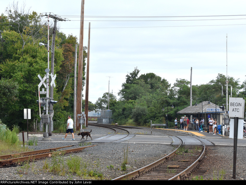 A nice size crowd of passengers waiting for NJT Train # 4724 at Bay Head Station